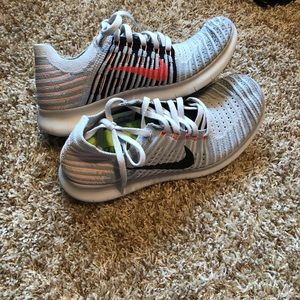 Women’s Nike Free RN Flyknit tennis shoes